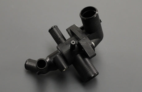 Land Rover Defender 2.4L Puma thermostat housing LR004656