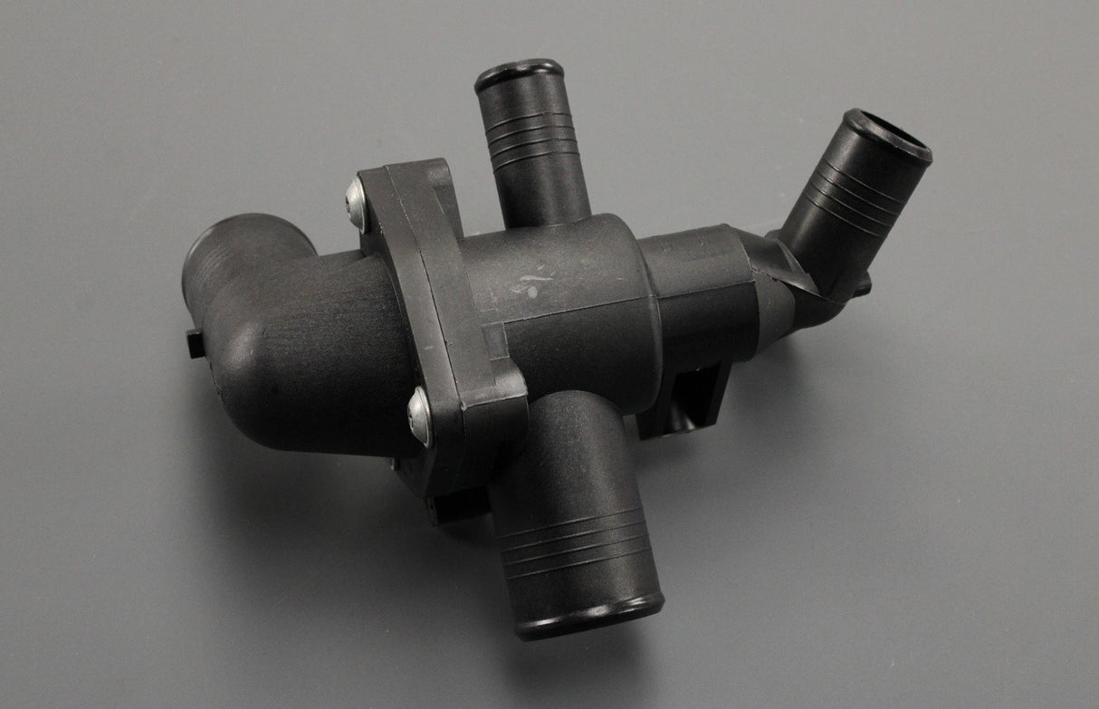 Land Rover Defender 2.4L Puma thermostat housing LR004656