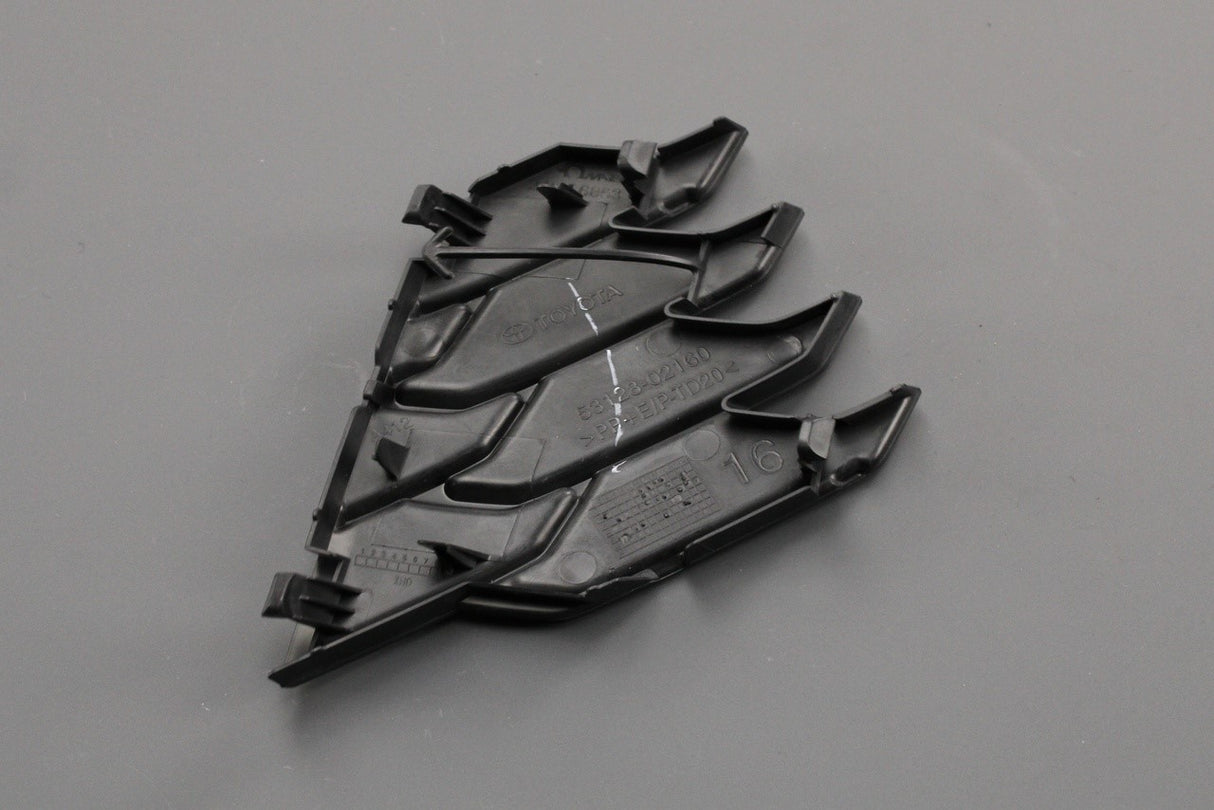 Toyota Corolla 19-on front tow hook cover (left) 53128-02160