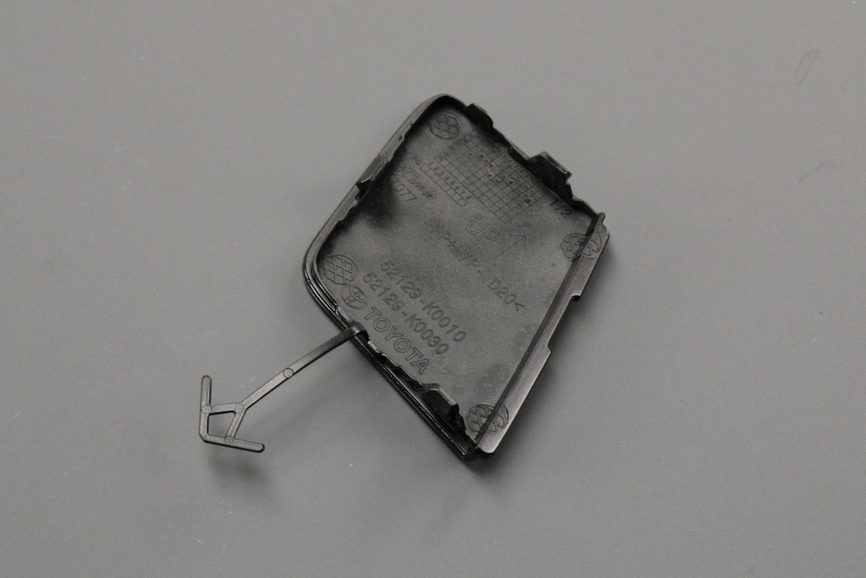 Toyota Yaris 2020-on bumper tow eye cover (front) 52129-K0030