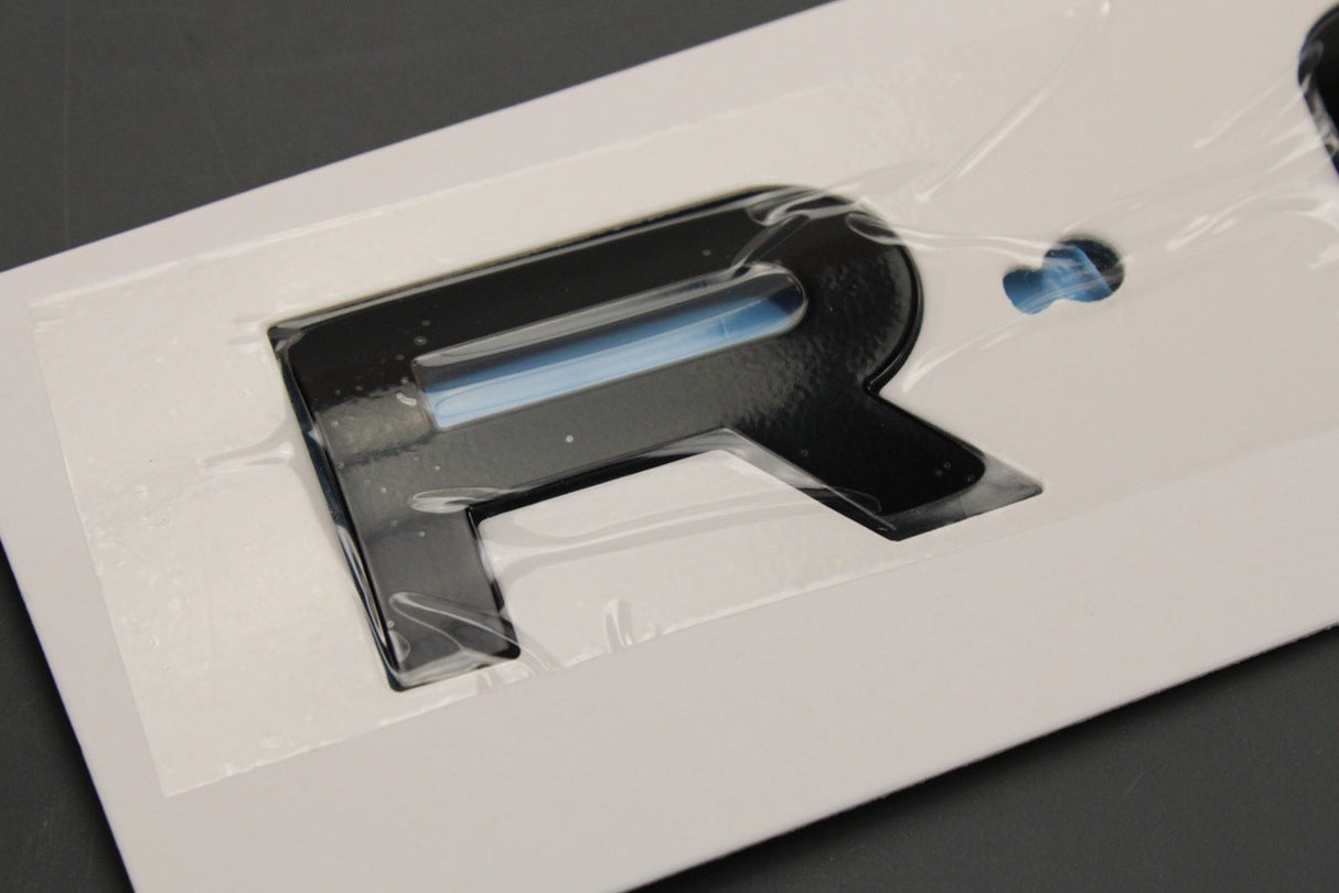 Range Rover Evoque 2019-on 'ROVER' badge emblem (front) LR162799