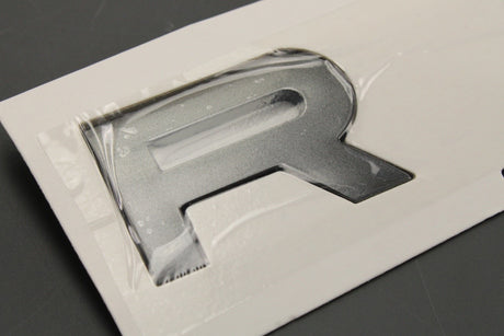 Range Rover Velar 2017-on 'ROVER' bonnet emblem text (front) LR092804