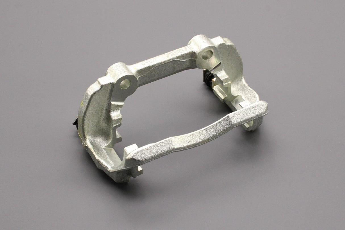 VW Polo 9N Skoda Fabia SEAT front brake caliper carrier (left) 6Q0615125