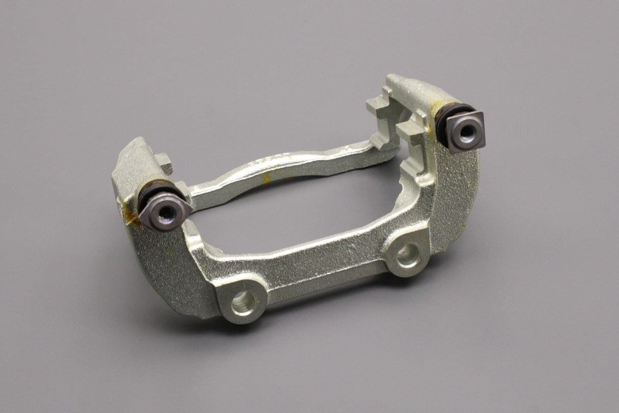 VW Polo 9N Skoda Fabia SEAT front brake caliper carrier (left) 6Q0615125