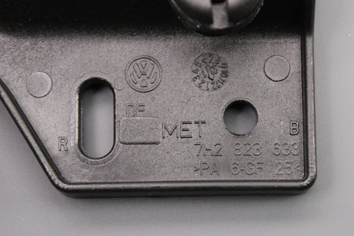 VW Transporter 2003-24 RHD bonnet release handle bracket 7H2823633B