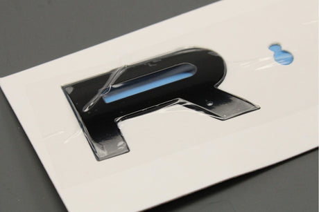 Land Rover Range Rover Sport 23-on black "Rover" badge (front) LR168911