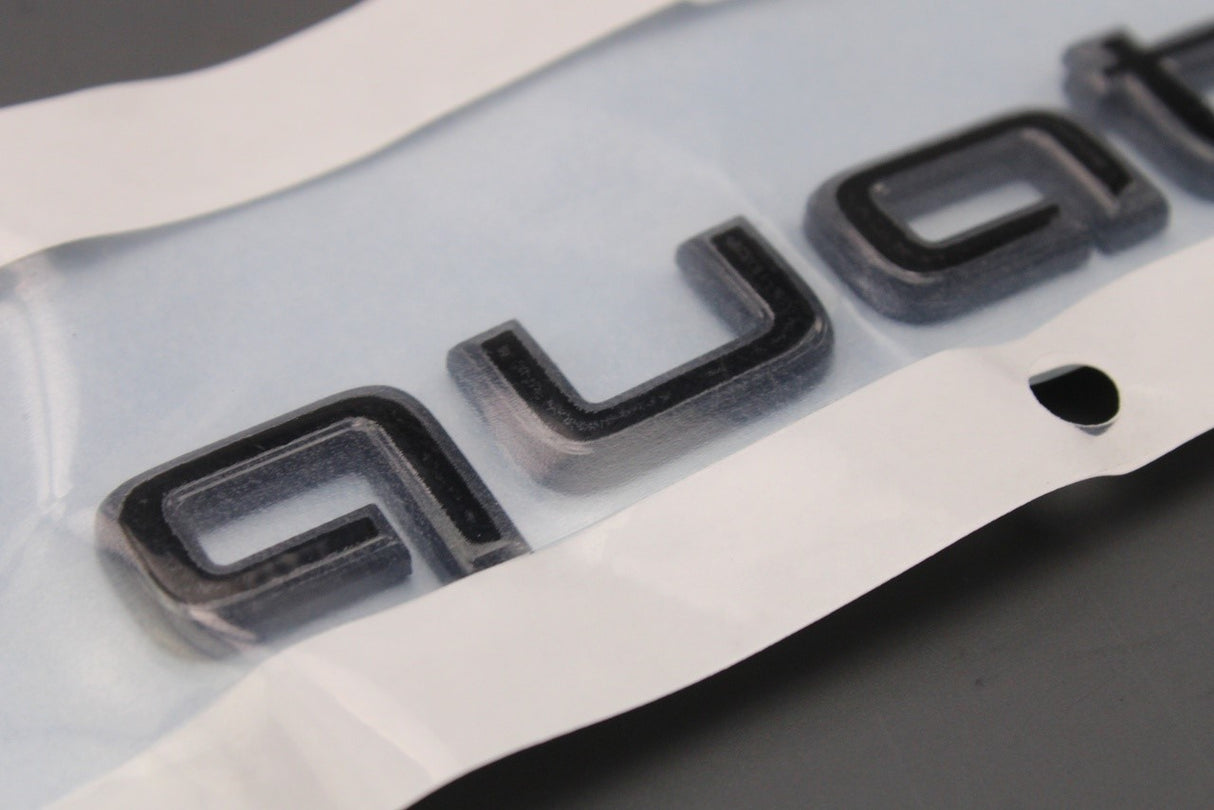 Audi e-tron 2019-on rear Quattro lettering badge black 4KE071806