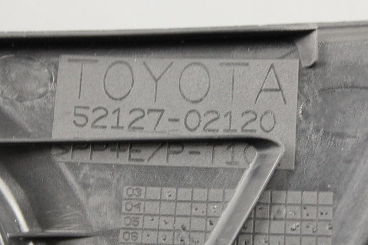 Toyota front bumper fog light trim 52127-02120