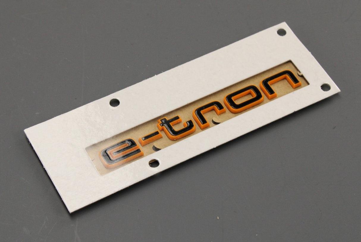 Audi e-Tron 2019-on orange 'e-tron' lettering (front wing) 4KE071807