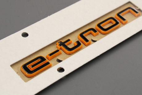 Audi e-Tron 2019-on orange 'e-tron' lettering (front wing) 4KE071807