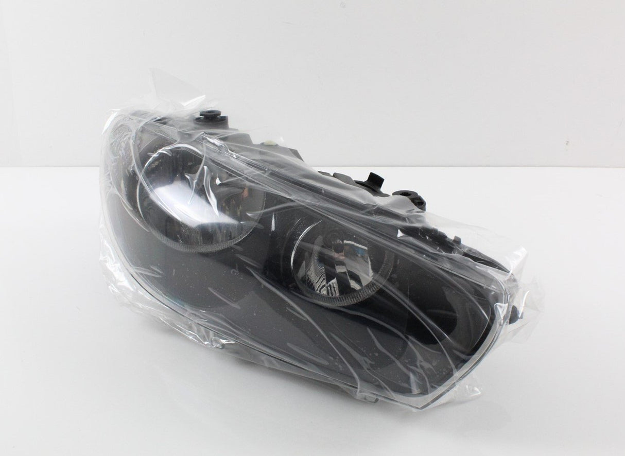 VW Scirocco 2009-14 right drivers side halogen headlight 1K8941006N