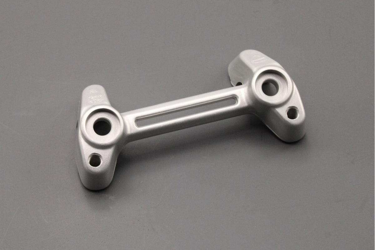 Ducati DesertX 2022-25 lower handlebar clamp piece 36015951AB, view 1