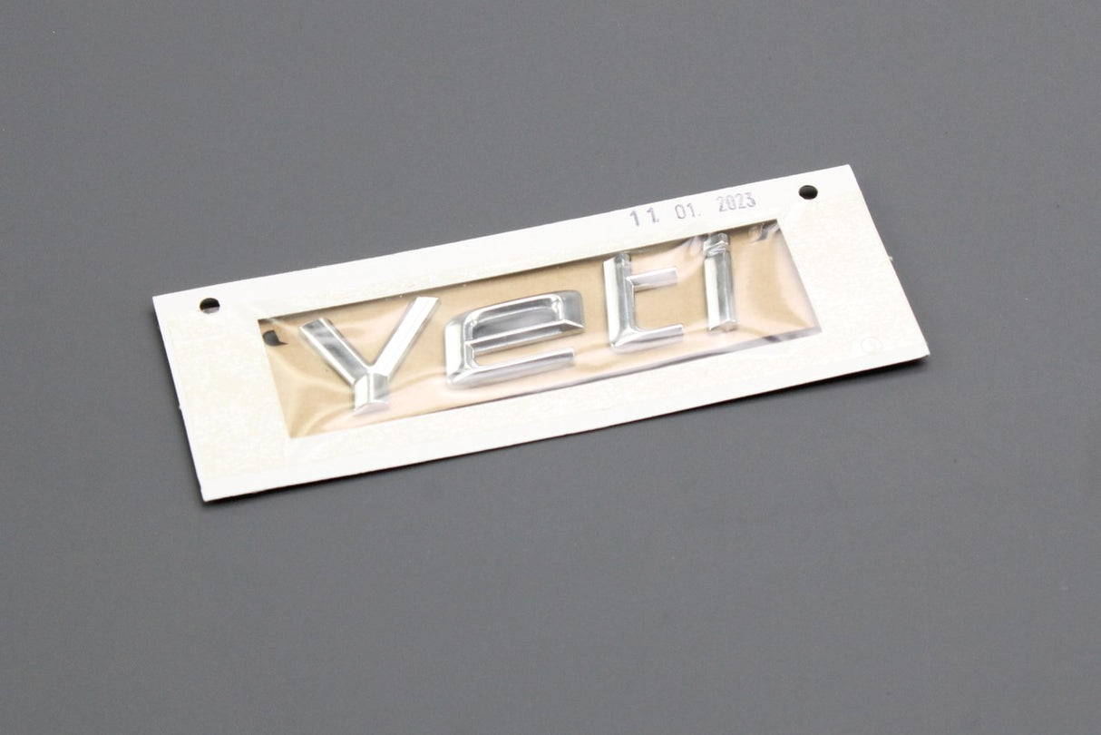 Skoda Yeti 2010-2013 rear boot lid 'YETI' badge (chrome) 5L0853687 739