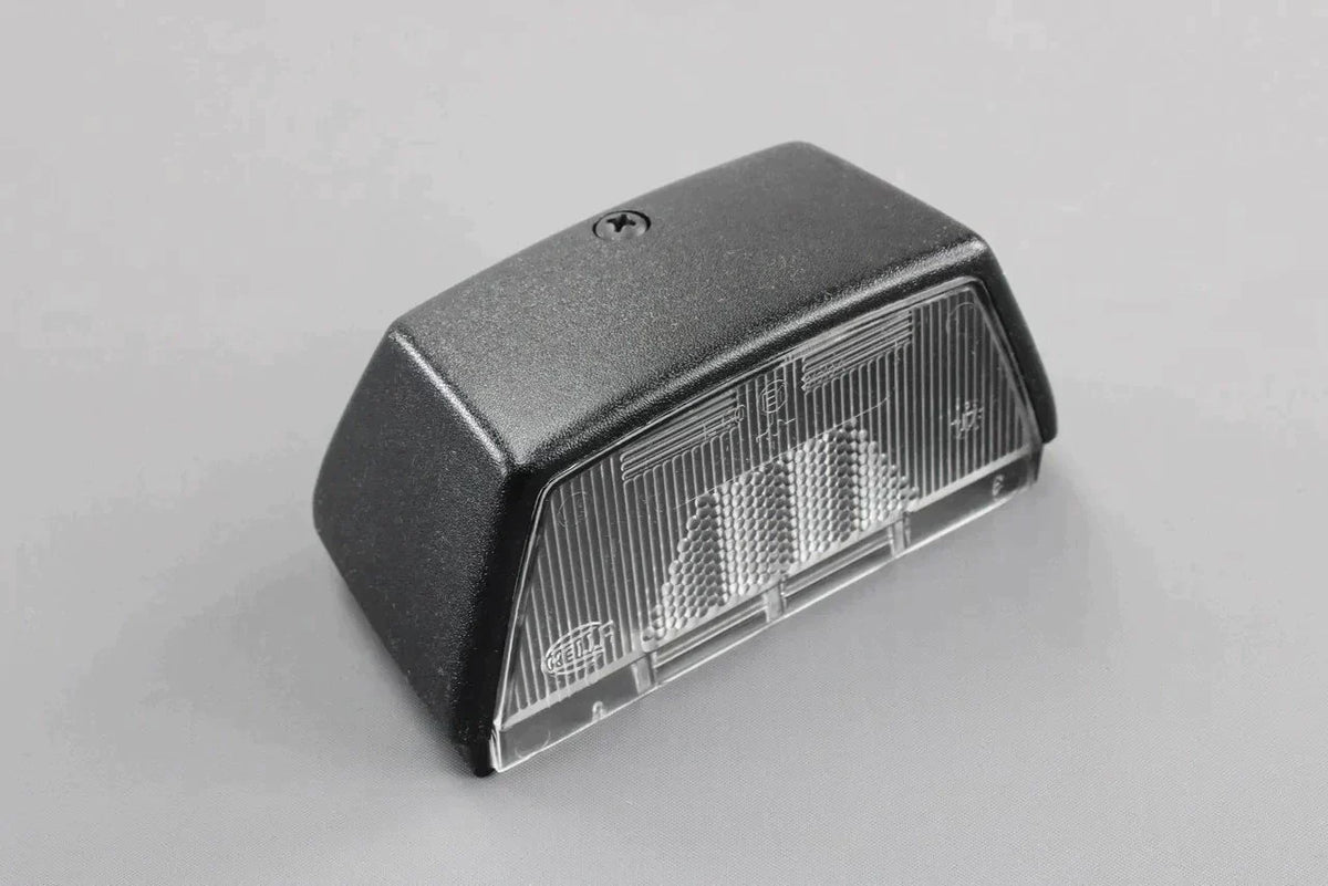 VW Transporter Pick-up T5.1 T6 rear number plate light lens 7F0943111, view 1