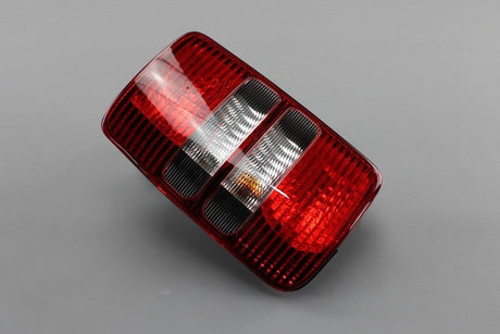 VW Caddy Cross 2011-15 left inner rear light unit (tinted) 2K5945095M