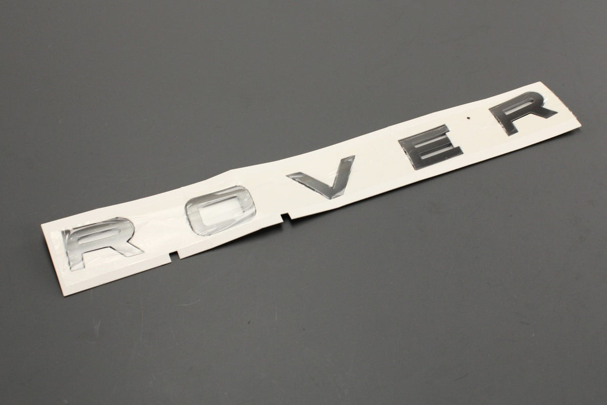 Range Rover Velar 2017-on 'ROVER' bonnet emblem text (front) LR092804, view 1