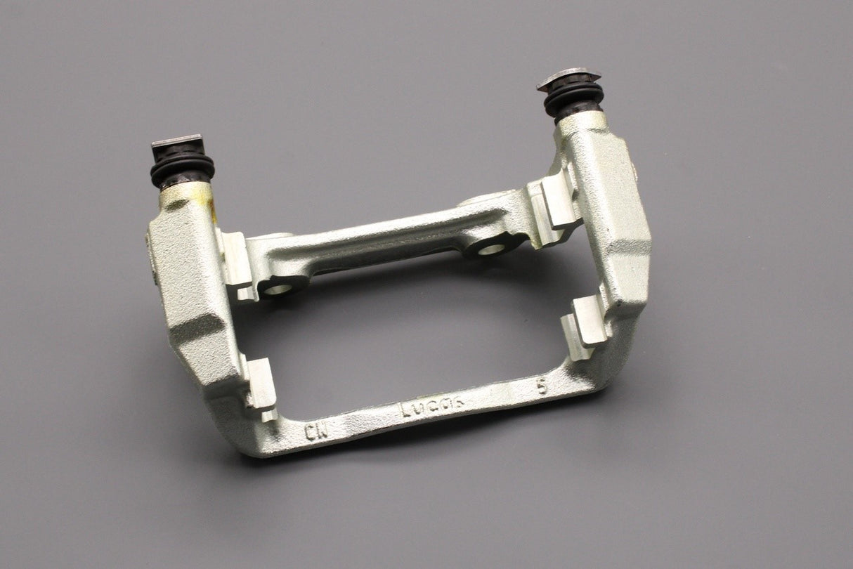 VW Polo 9N Skoda Fabia SEAT front brake caliper carrier (left) 6Q0615125