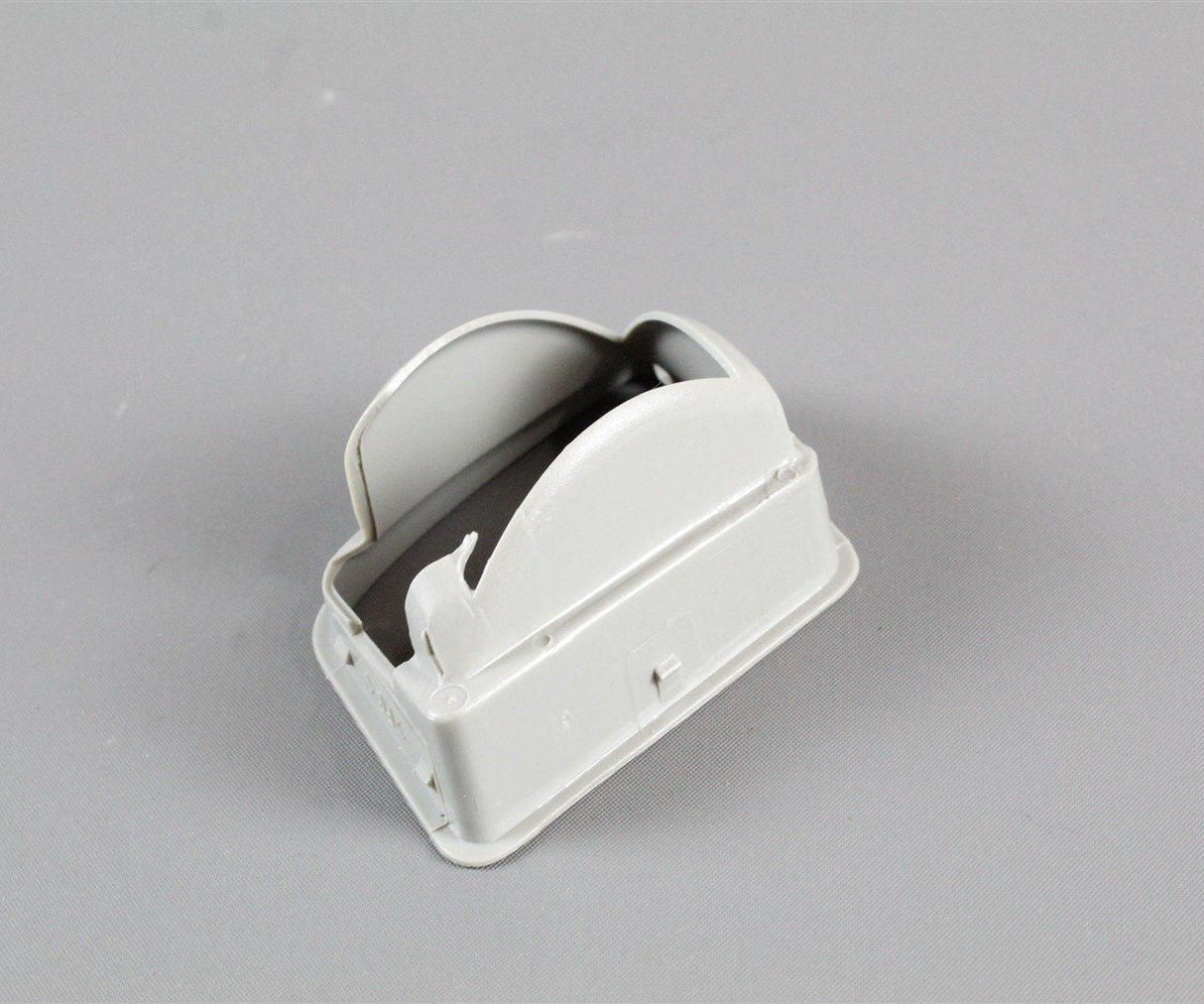 VW Beetle 99-05 Left retaining bracket for number plate light 1C0943137