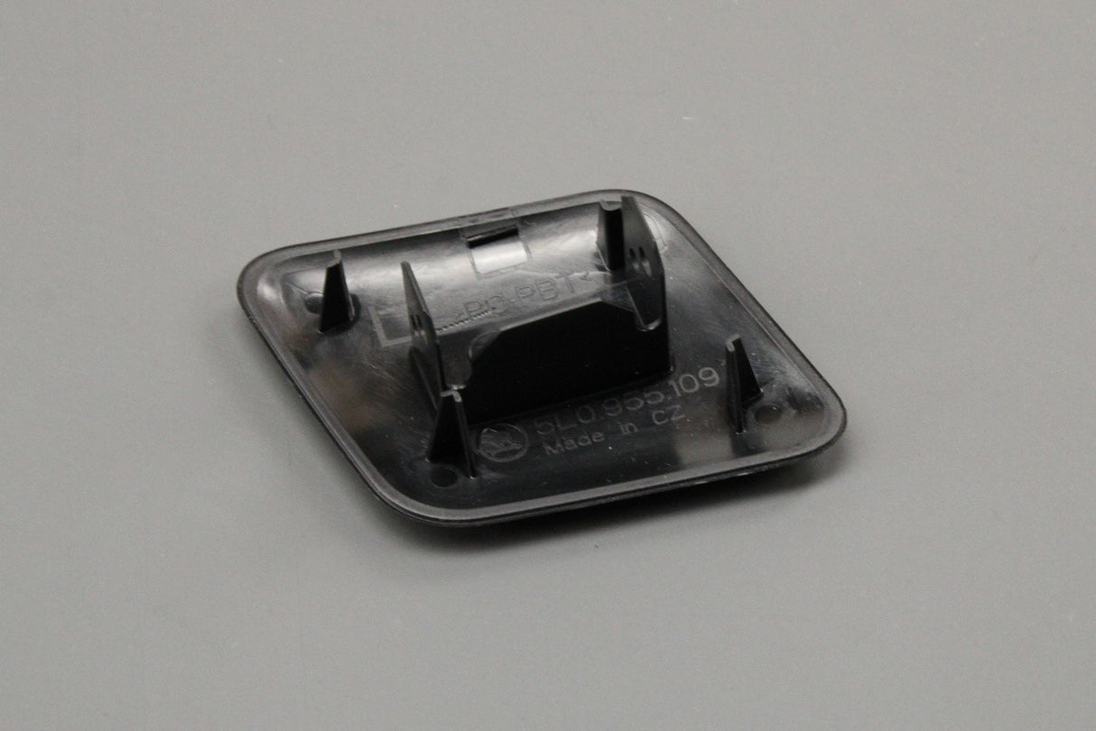 Skoda Yeti 2010-2013 headlight washer jet cover (left) 5L0955109