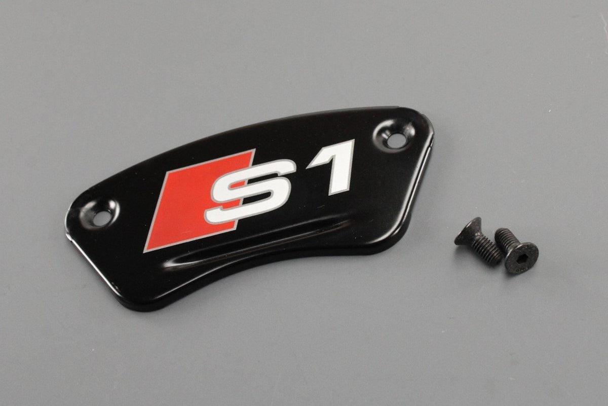 Audi S1 2015-18 front brake caliper trim "S1" (x1) 8X0698221, view 1