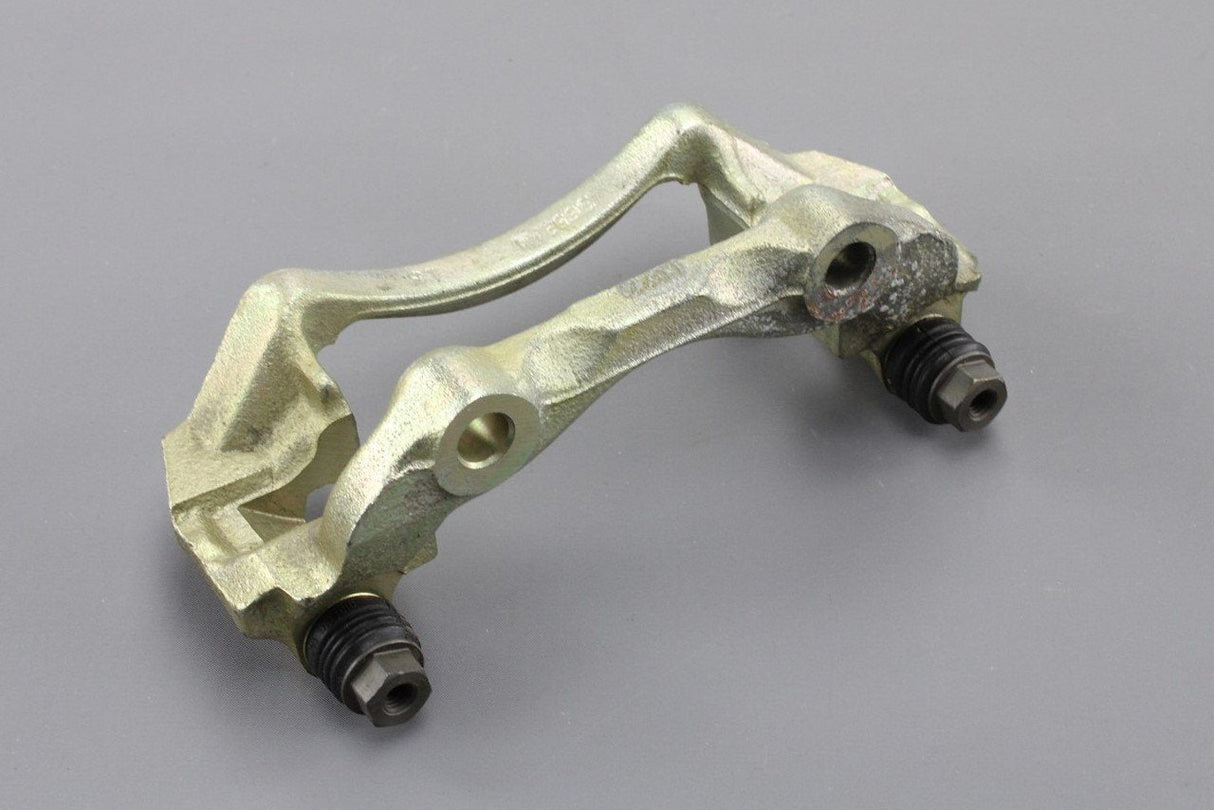 VW Passat B3 Audi 80/90/100 front brake caliper carrier 443615125E