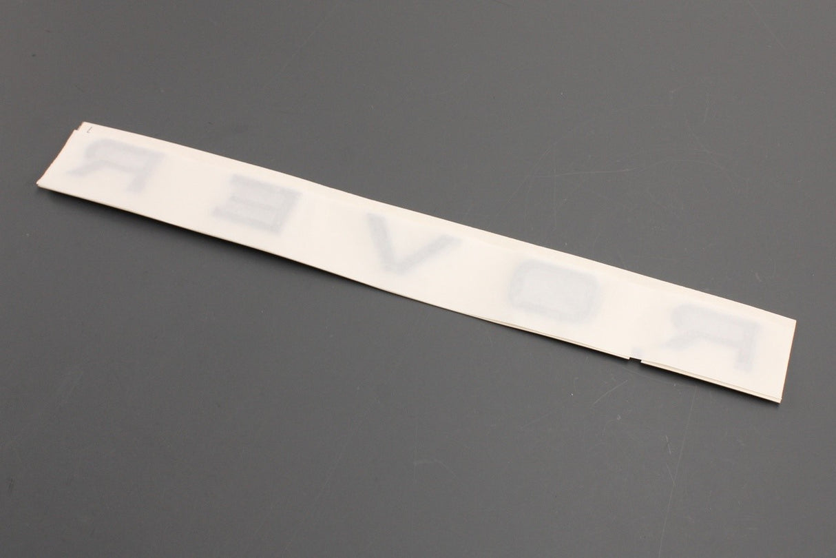 Range Rover Evoque L538 12-18 "ROVER" badge lettering (front) LR094560