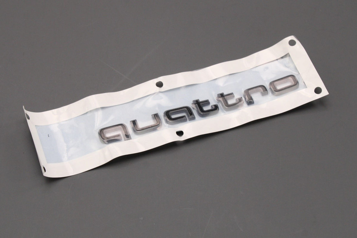 Audi e-tron 2019-on rear Quattro lettering badge black 4KE071806 ...