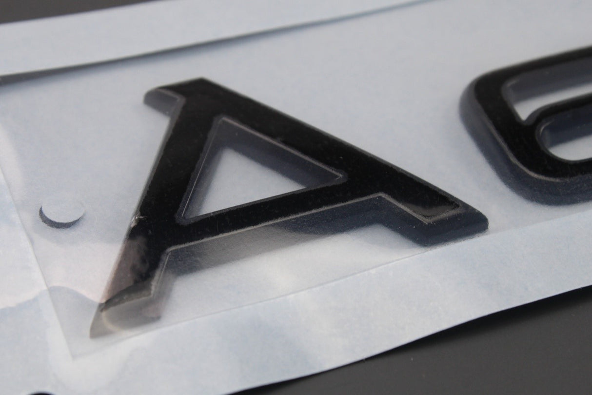 Audi A6 2019-on rear boot lid lettering badge gloss black 4F0853741B T94