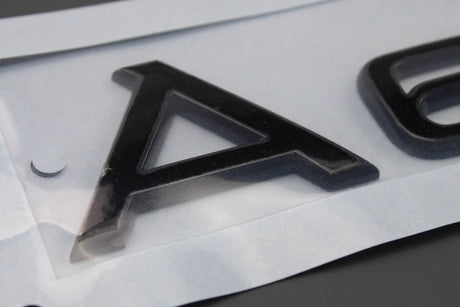 Audi A6 2019-on rear boot lid lettering badge gloss black 4F0853741B T94