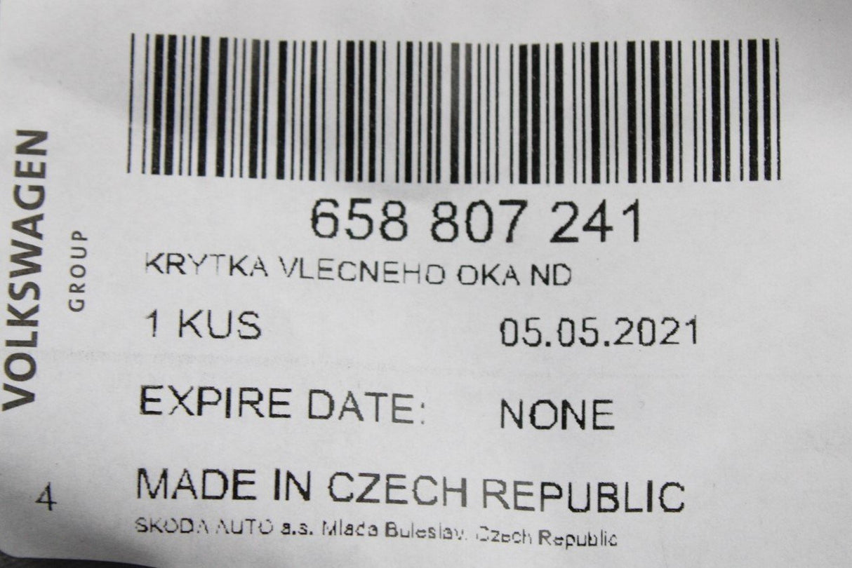 Skoda Scala Kamiq front bumper towing eye cover trim (primed) 658807241