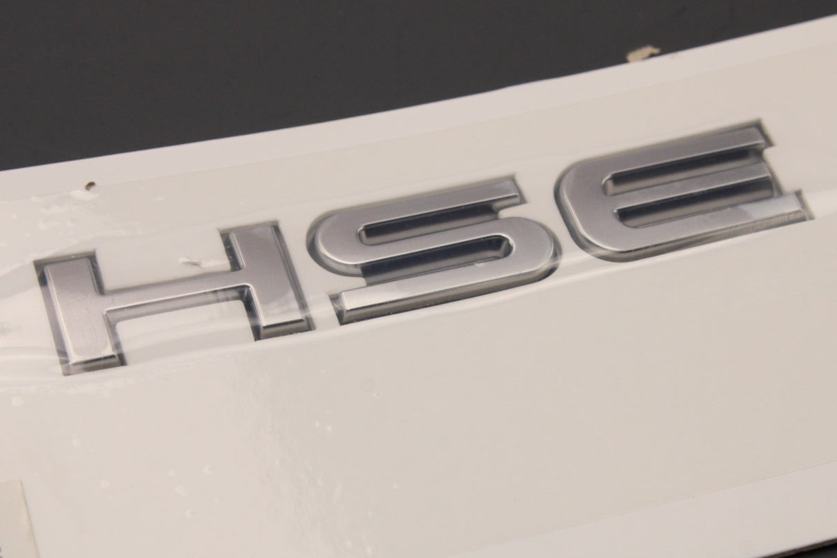 Range Rover 2013-2022 rear 'HSE' badge emblem LR113642