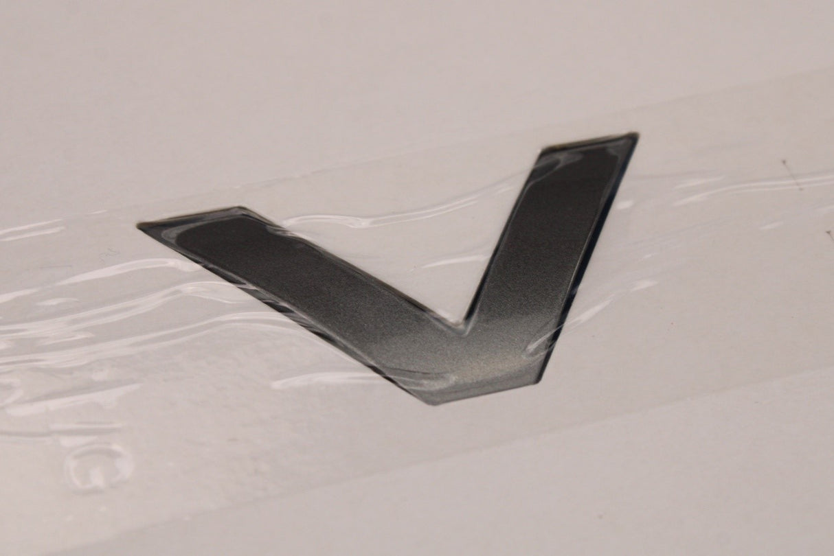 Range Rover Velar 2017-on rear 'ROVER' badge emblem LR154636