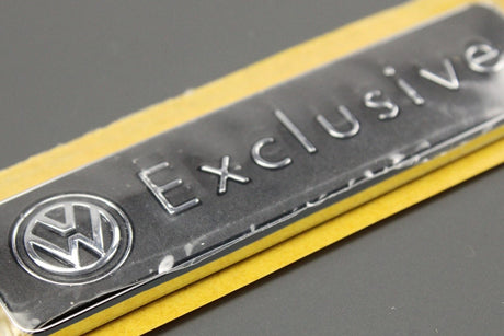 VW Exclusive emblem badge 1K0853688F 739