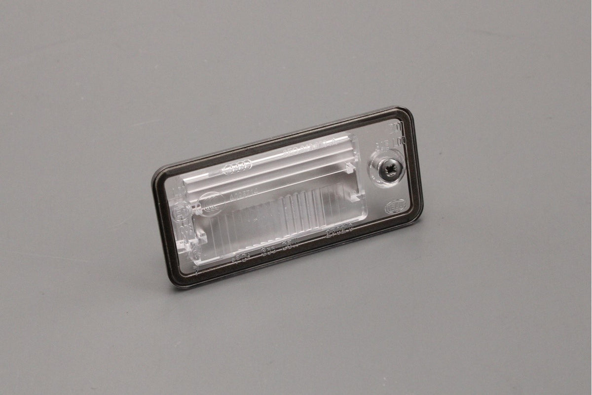 Audi A3 A4 A6 Q7 RS4 04-17 number plate light holder (right) 8E0807430B, view 1